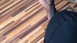 Blonde tattooed lady and her foot slave