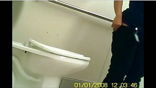 Sexy colleague in the ladies' room on hidden cam pissing