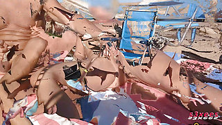 On the beach in public in Cap d'Agde, mutual masturbation with ejaculation. Exhibition