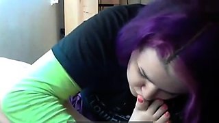 Goth emo girl licks her own feet