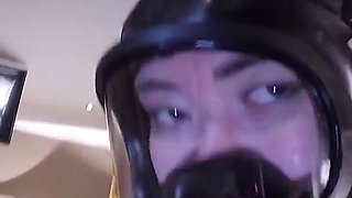 Two Fully Rubberized Rubber Dolls on Latex Sheets with Gas Mask and Liquid Container