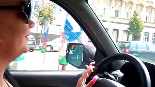 Gina drives car with great Long Nails