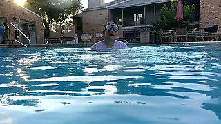 Couple Underwater Diving and Swimming