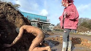 Extreme ballbusting in the mud Miss Eva Ray