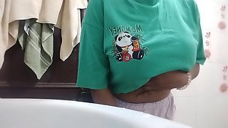MILF Mona Shows off Her Big Tits in Bathroom