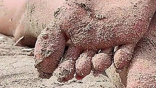 Covered in Sand and Above It All