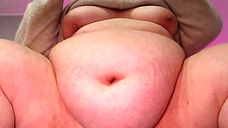 Beautiful and lazy bbw with a soft tummy nurse sits on webcam