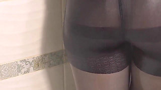 Teen Amateur In Wet T-Shirt And Pantyhose Showering In The Hotel