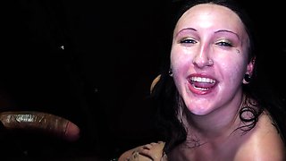 Brunette beauty Raven Vice sucks a cock through a gloryhole