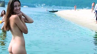 Hot young nudists secretly filmed having fun