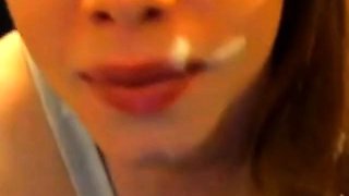 Pretty lass gets spunked and swallows cum on webcam