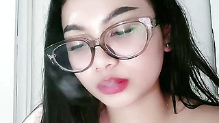 Woman wearing cleavage glasses