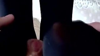 First footjob and thick cum on tight