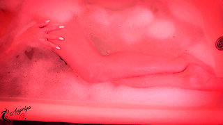 A Girl with an Excellent Figure Has Fun in the Bathroom with a Dildo