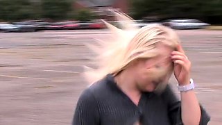 Outdoor solo masturbation scene with curly blonde
