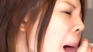 Sexy Japanese school girl sucks and slurps on two big dicks