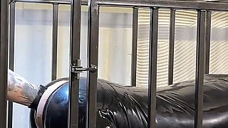 Anal Stretching a Caged Gimp