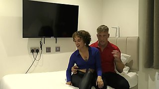 A brunette woman with a tattoo fucks in doggystyle while wearing a thong