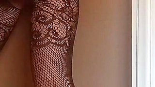In a Nylon Catsuit and High Heels I Suck a Cock and Fuck It in a Gloryhole Until It Cums in My Mouth