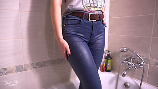 Girl Teases Wet Camel Toe in Blue Jeans