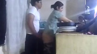 The maid was slapped in the kitchen by her boss