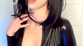 Busty babe playing with her big boobs
