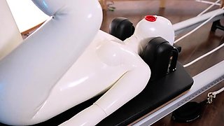White latex doll gets her physical workout session with