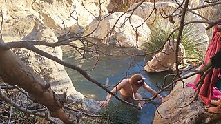 Cute sissy Wet Bibe enjoys a romantic bath in steaming springs with her girlfriend