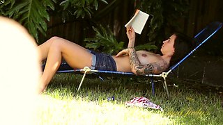 Liandra Dahl touches herself outside