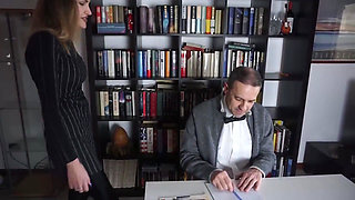 Femdom chick punishes her male slave in the office