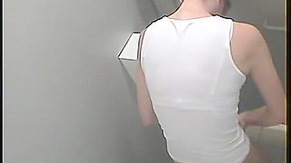 Girl sitting on a toilet caught on voyeur&#039;s camera while peeing