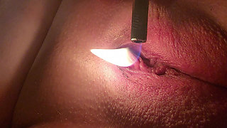 Sexy Shaved Pussy and Clit Teased and Singed with Flame