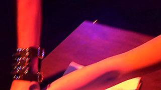 Submissive girl to her 2 mistress in the leather sexy outfit. She feels that torment