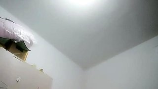 Cute amateur asian web cam girl playing with her toy