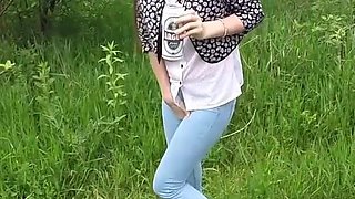 Skinny Brunette with Full Bladder Has to Pee in the Forest and Wet the Tall Grass Touching Her Wet Pussy