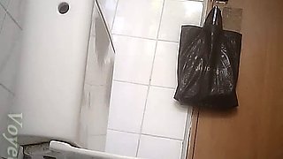 Mature and chunky white lady gets filmed on hidden cam in the toilet
