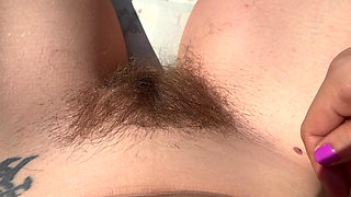 Trimming my bush and my hairy legs closeup outdoor