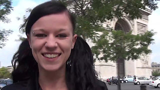 Vanessa , a pretty brunette, shows off on the Champs Elysees