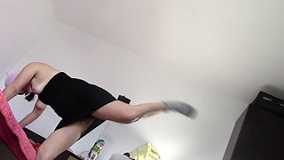 Amateur wife dancing naked at home. Amateur woman has fun trying on clothes and cutting them.
