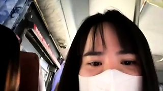 two sisters being sensual on the bus for the camera 84412587