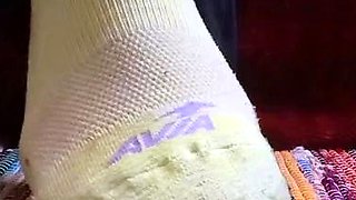 Cute teen girl enjoys foot fetish
