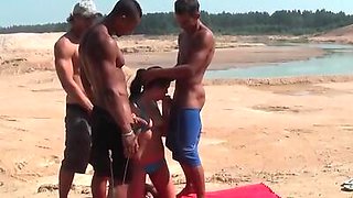 young brunette fucked on the beach in all holes