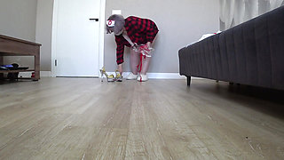 Home camera watches fat legs from below on the floor. Mature wife changes into a sexy nurse uniform. Foot fetish.