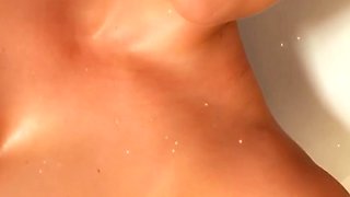 Glamour babe with big boobs masturbates in lingerie