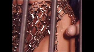 Two Beautiful Vintage Lesbian MILFs Fuck Each Other's Pussy with a Strapon in the Cage