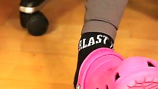 Under Desk Foot Play - Pink Clogs & Worn Socks