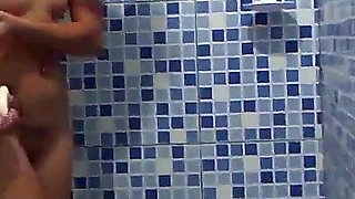 Hot Girl in the Shower Taking a Bath.