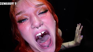 The slutty redhead woman fucked through the hole in gloryhole