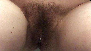 Power Pissing From a Perfect Hairy Pussy in Public Toilets