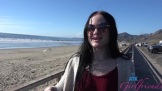 Beautiful brunette Imani Valor has glasses and long hair while having sex outside.